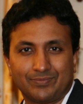 Dr. Varghese John